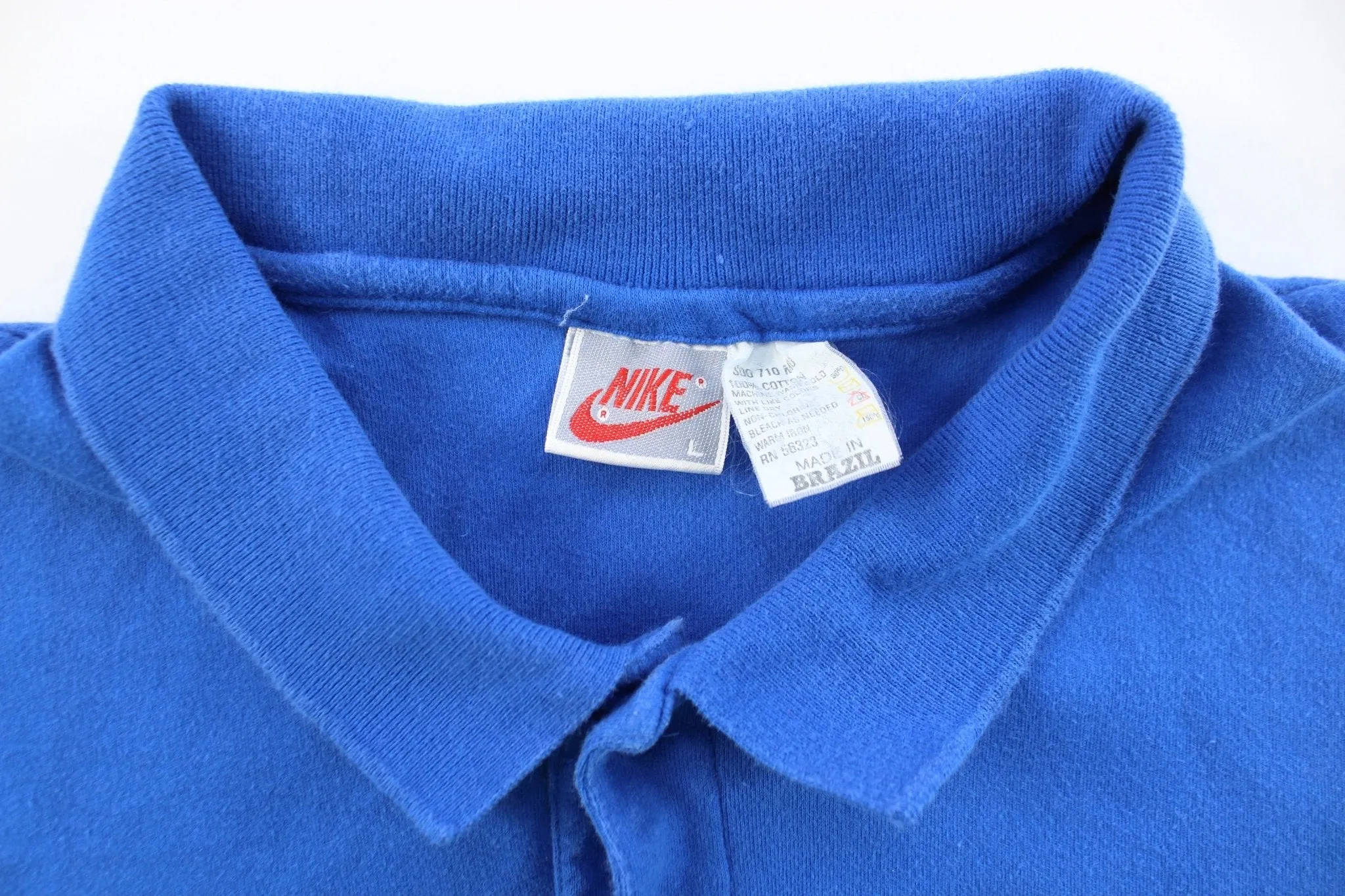 Vintage Nike Embroidered Logo Blue Button Up Polo